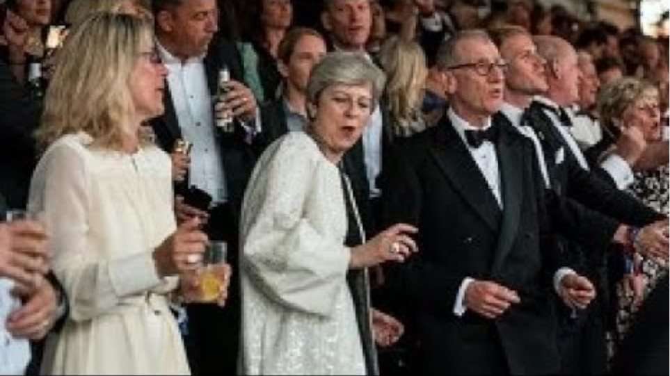 Crazy Theresa May dances and sings to Abba hits at posh black-tie music festival